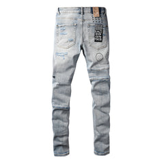 Purple Jeans Edgy Streetwear Men’s Light Blue Ripped Skinny Jeans with Futuristic Symbol Graphic Patches and Heavy Distressing 3048
